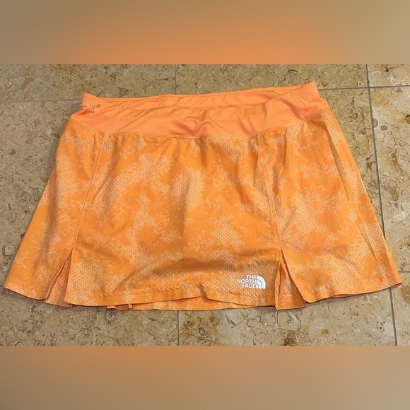 The North Face Dresses & Skirts - The North Face NWOT Geometric Orange Skirt w/ Built in Shorts Size M